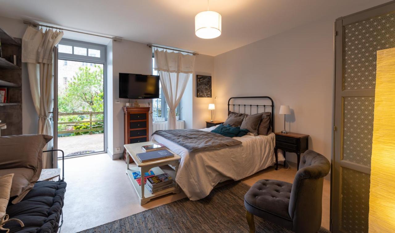 Apartamento Chambre D Hote "Sous Le Clocher" Saint-Léonard-de-Noblat Exterior foto