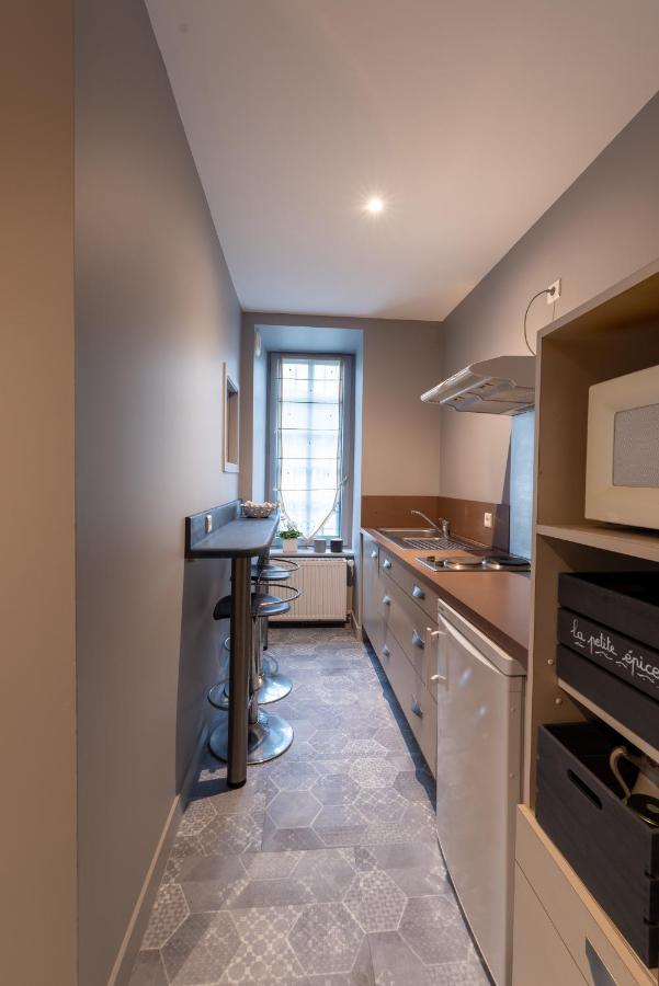 Apartamento Chambre D Hote "Sous Le Clocher" Saint-Léonard-de-Noblat Exterior foto